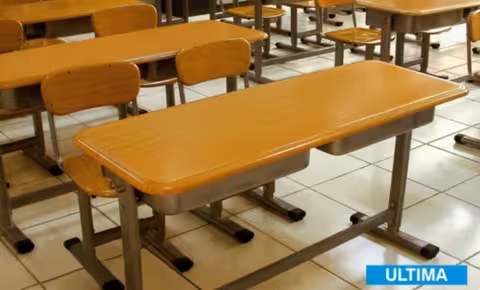 Wooden double desk units with integrated two-seat arrangement for students